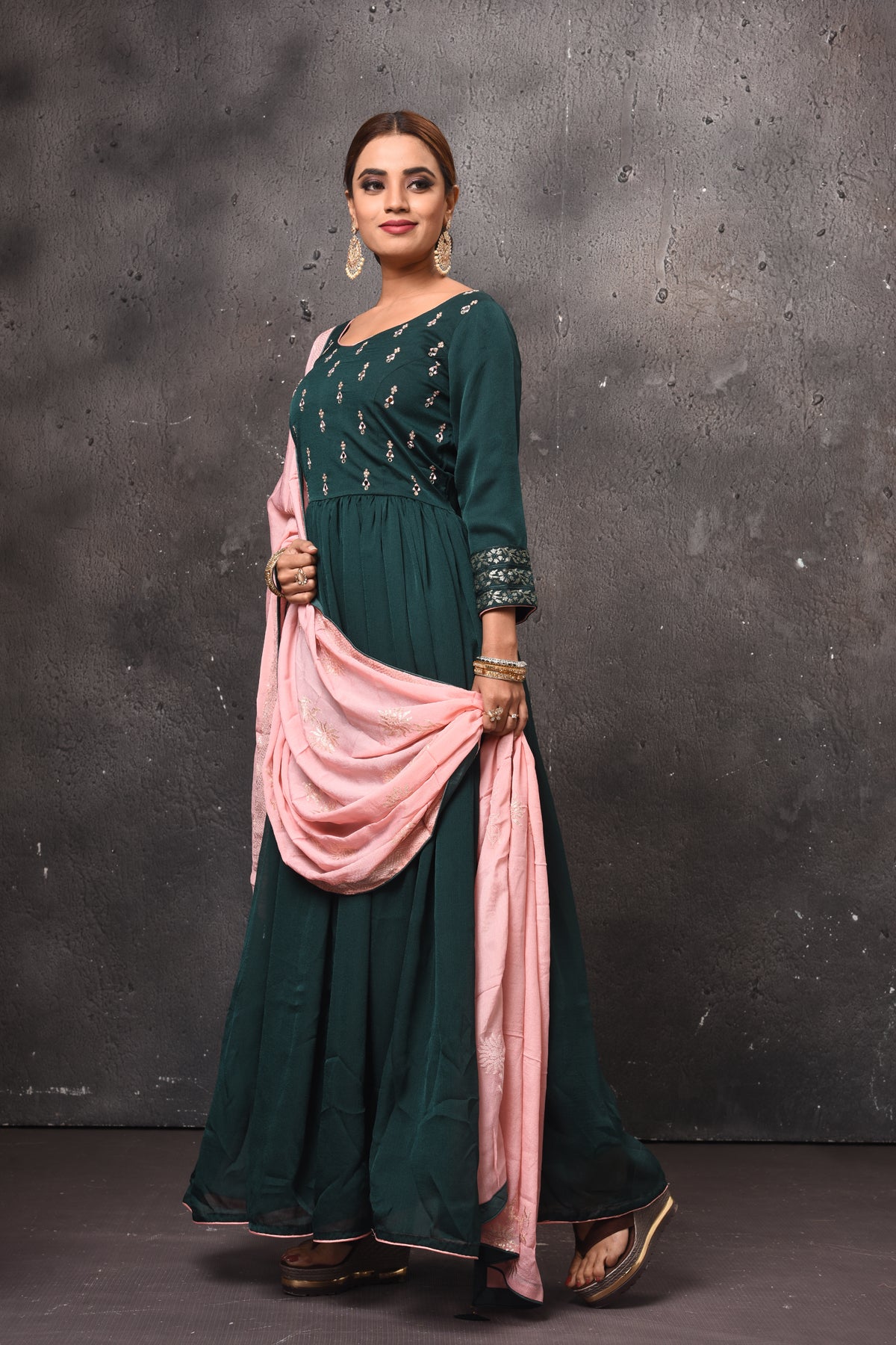 Buy beautiful dark green embroidered Anarkali suit online in USA with pink dupatta. Get set for weddings and festive occasions in exclusive designer Anarkali suits, wedding gown, salwar suits, gharara suits, Indowestern dresses from Pure Elegance Indian fashion store in USA.-right