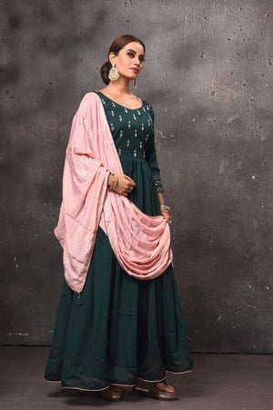 Buy beautiful dark green embroidered Anarkali suit online in USA with pink dupatta. Get set for weddings and festive occasions in exclusive designer Anarkali suits, wedding gown, salwar suits, gharara suits, Indowestern dresses from Pure Elegance Indian fashion store in USA.-left