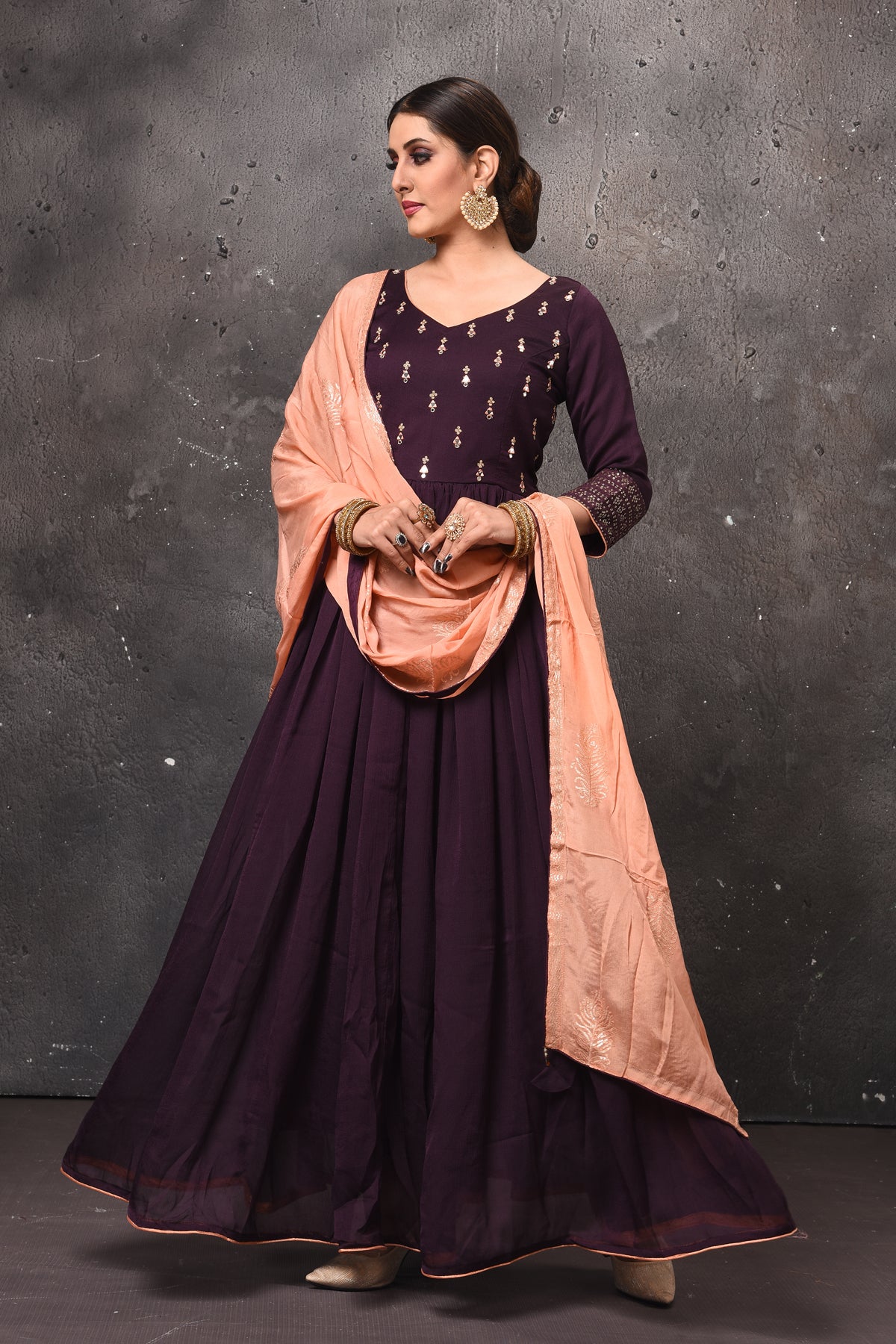 Shop beautiful aubergine embroidered Anarkali suit online in USA with peach dupatta. Get set for weddings and festive occasions in exclusive designer Anarkali suits, wedding gown, salwar suits, gharara suits, Indowestern dresses from Pure Elegance Indian fashion store in USA.-full view