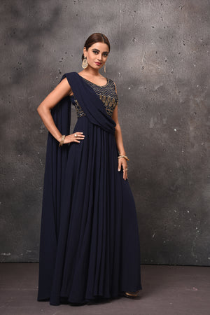 Shop beautiful navy blue draped gown online in USA. Get set for weddings and festive occasions in exclusive designer Anarkali suits, wedding gown, salwar suits, gharara suits, Indowestern dresses from Pure Elegance Indian fashion store in USA.-side