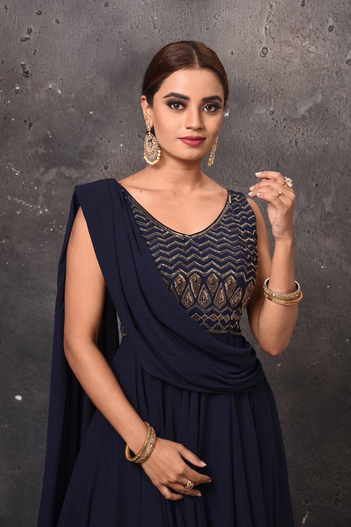 Shop beautiful navy blue draped gown online in USA. Get set for weddings and festive occasions in exclusive designer Anarkali suits, wedding gown, salwar suits, gharara suits, Indowestern dresses from Pure Elegance Indian fashion store in USA.-closeup