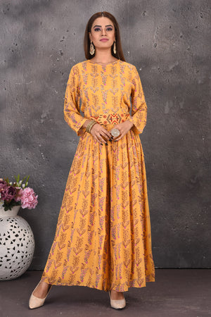 Shop beautiful yellow printed jumpsuit online in USA with multicolor embroidery waistband. Look stylish at parties and wedding festivities in designer dresses, Indowestern outfits, Anarkali suits, wedding lehengas, palazzo suits, sharara suits from Pure Elegance Indian clothing store in USA.-front