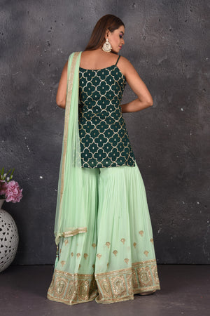 Buy beautiful dark and mint green embroidered sharara suit online in USA with dupatta. Look stylish at parties and wedding festivities in designer dresses, Indowestern outfits, Anarkali suits, wedding lehengas, palazzo suits, sharara suits from Pure Elegance Indian clothing store in USA.-back
