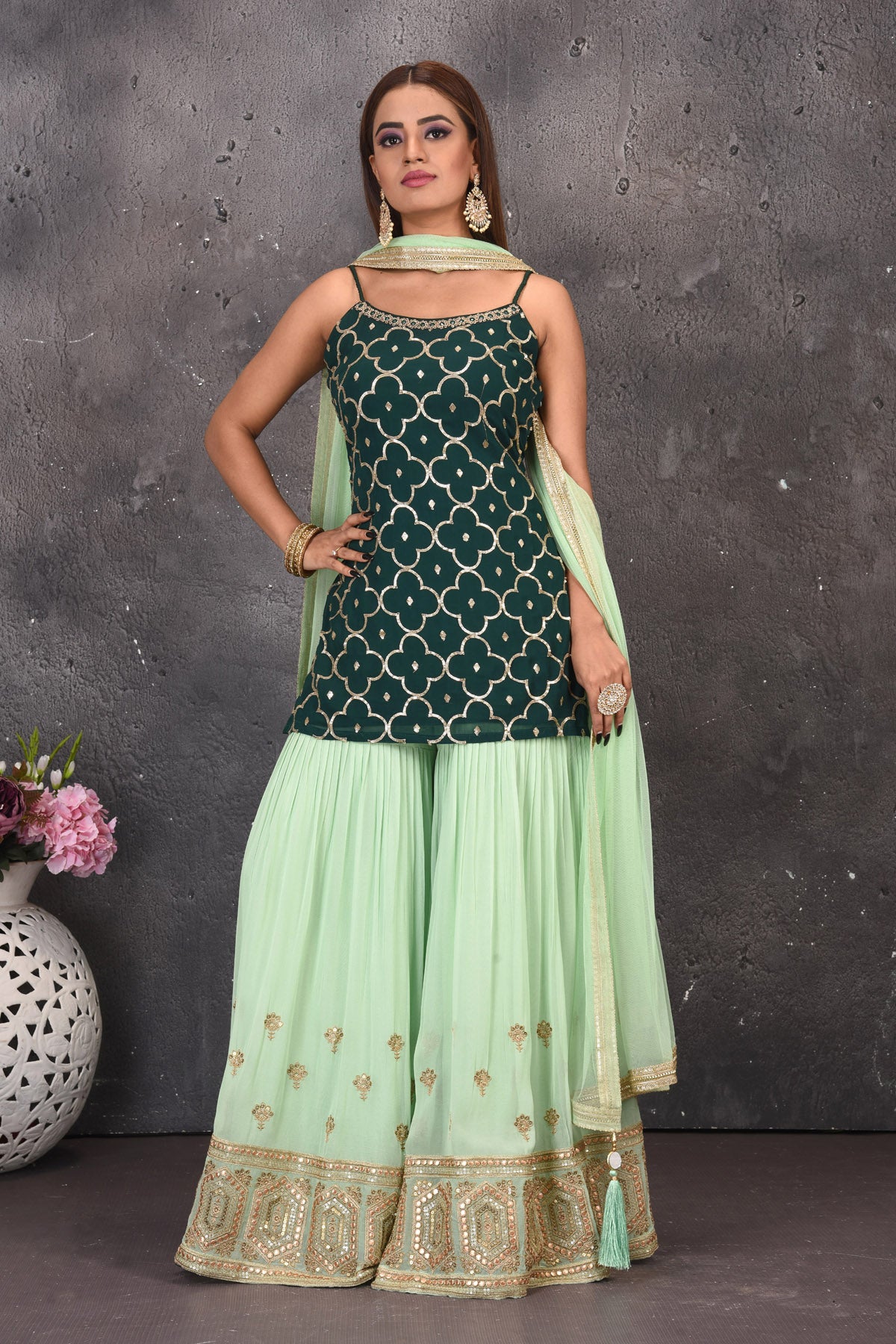 Buy stunning dark green and mint green embroidered sharara suit online in USA with dupatta. Look stylish at parties and wedding festivities in designer dresses, Indowestern outfits, Anarkali suits, wedding lehengas, palazzo suits, sharara suits from Pure Elegance Indian clothing store in USA.-front