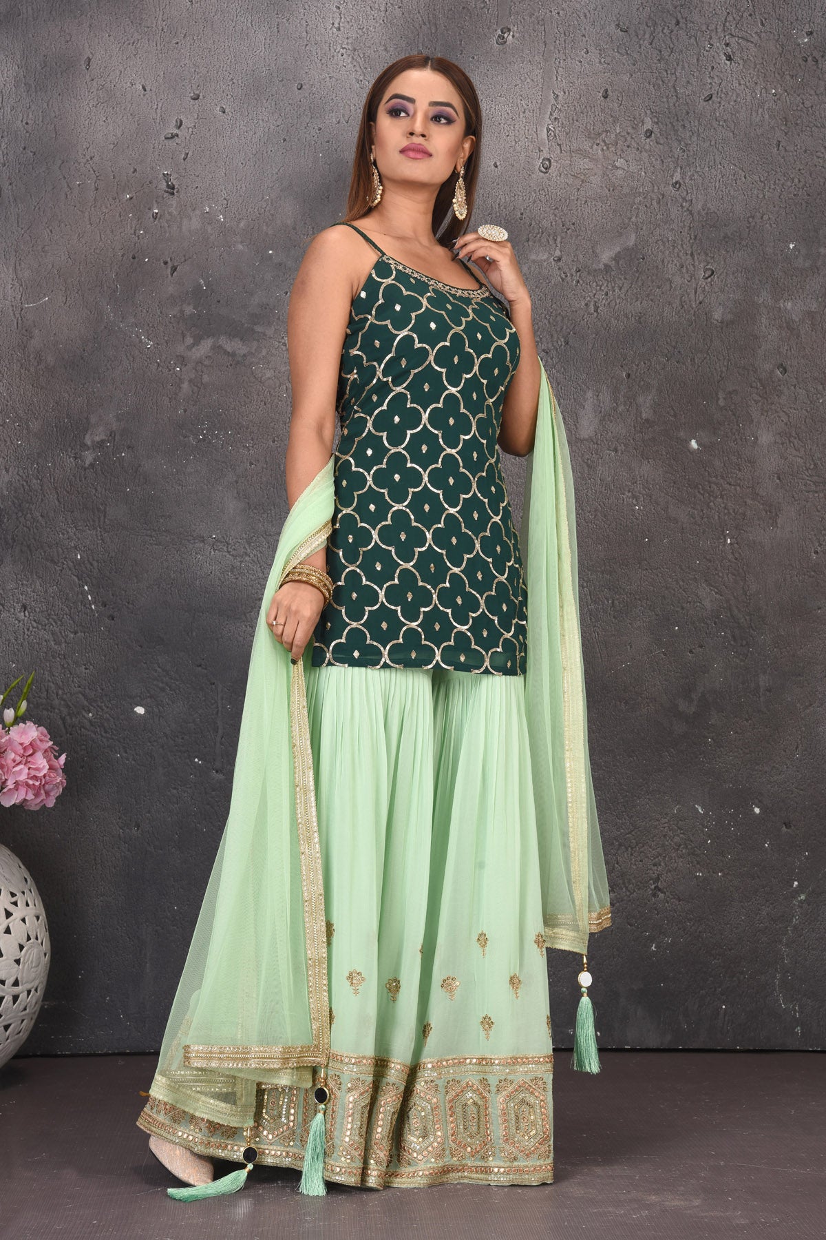 Buy stunning dark green and mint green embroidered sharara suit online in USA with dupatta. Look stylish at parties and wedding festivities in designer dresses, Indowestern outfits, Anarkali suits, wedding lehengas, palazzo suits, sharara suits from Pure Elegance Indian clothing store in USA.-side