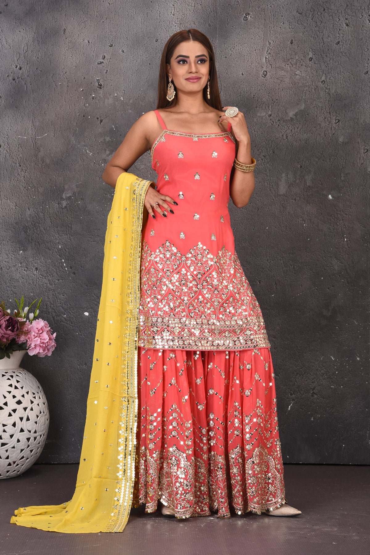 Shop beautiful pink mirror work sharara suit online in USA with yellow dupatta. Look stylish at parties and wedding festivities in designer dresses, Indowestern outfits, Anarkali suits, wedding lehengas, palazzo suits, sharara suits from Pure Elegance Indian clothing store in USA.-full view