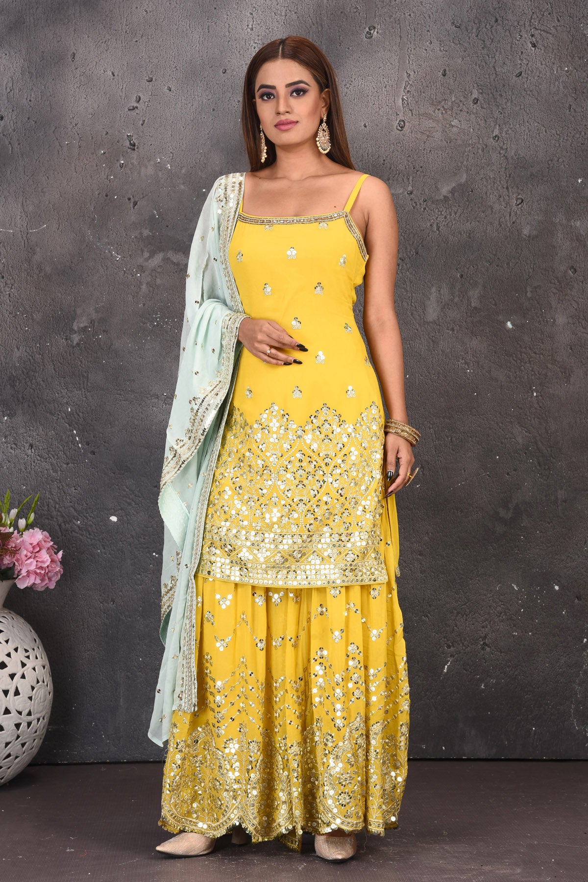 Shop stunning yellow mirror work sharara suit online in USA with powder blue dupatta. Look stylish at parties and wedding festivities in designer dresses, Indowestern outfits, Anarkali suits, wedding lehengas, palazzo suits, sharara suits from Pure Elegance Indian clothing store in USA.-full view