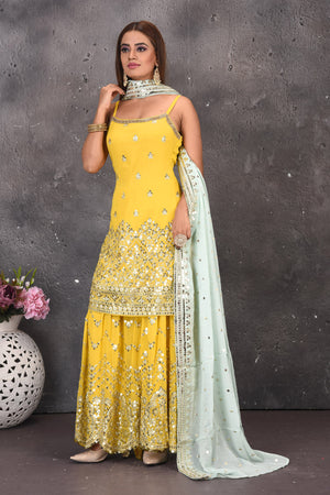 Buy stunning yellow mirror embroidery sharara suit online in USA with powder blue dupatta. Look stylish at parties and wedding festivities in designer dresses, Indowestern outfits, Anarkali suits, wedding lehengas, palazzo suits, sharara suits from Pure Elegance Indian clothing store in USA.-dupatta