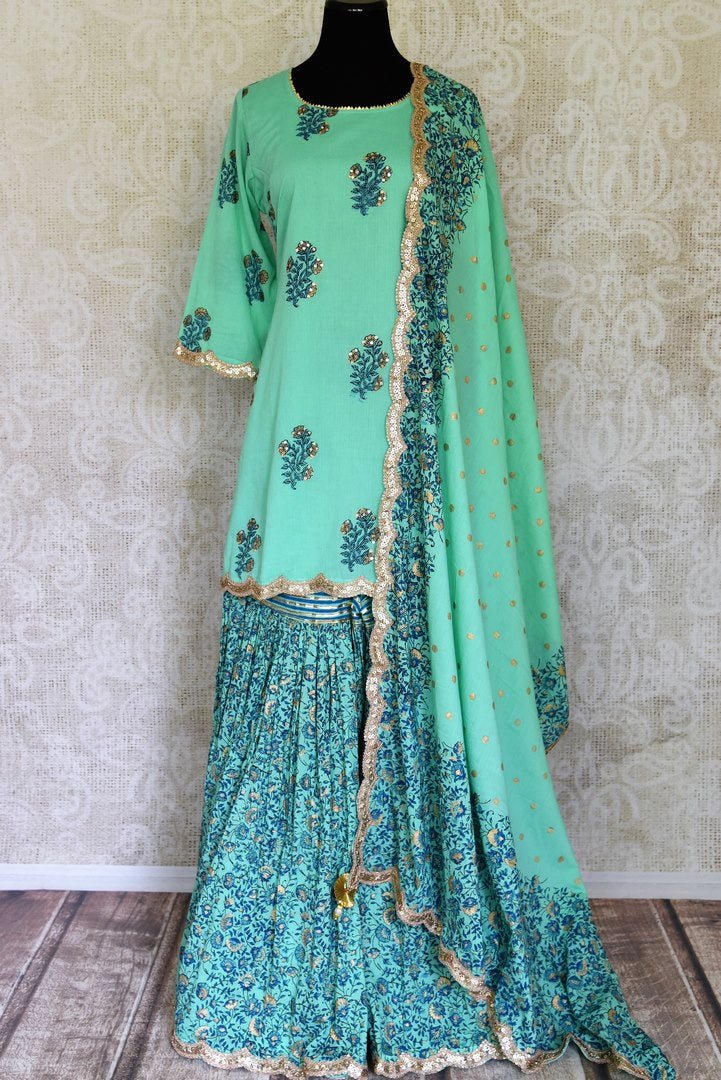 Buy beautiful green Kalamkari print sharara suit online in USA with gota sequin work, Be a vision of style and elegance on festive occasions in designer suits, desinger lehenga, shararas suits, Anarkali suit, designer gowns from Pure Elegance Indian fashion store in USA. -full view