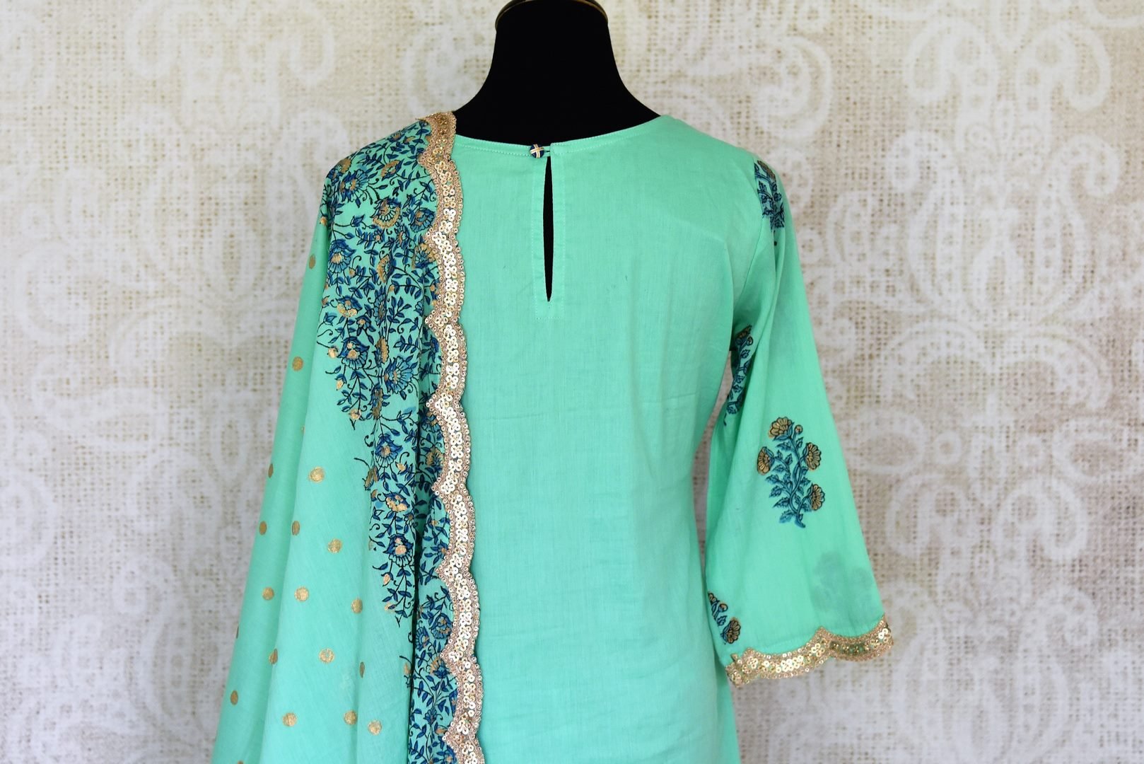 Buy beautiful green Kalamkari print sharara suit online in USA with gota sequin work, Be a vision of style and elegance on festive occasions in designer suits, desinger lehenga, shararas suits, Anarkali suit, designer gowns from Pure Elegance Indian fashion store in USA. -back
