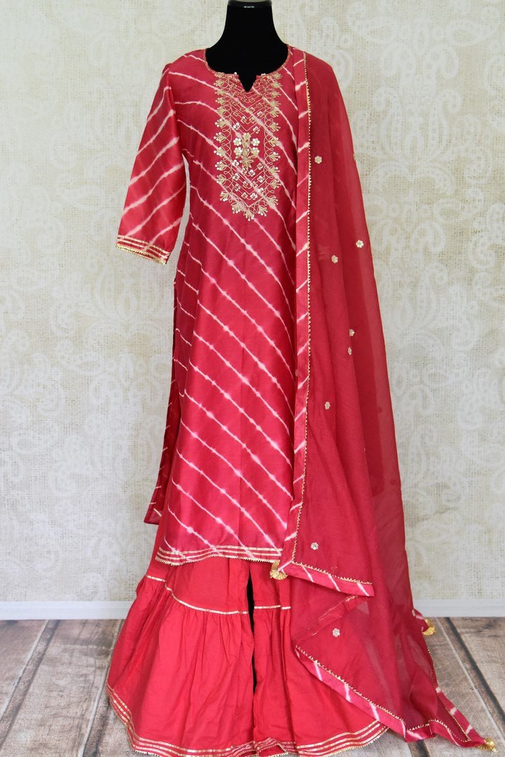 Shop stunning red chanderi silk sharara suit online in USA with dupatta. Get set to dazzle on festive occasions in this exquisite designer suits, Anarkali dress, sharara suits, salwar suits, palazzo suits from Pure Elegance Indian fashion store in USA.-full view