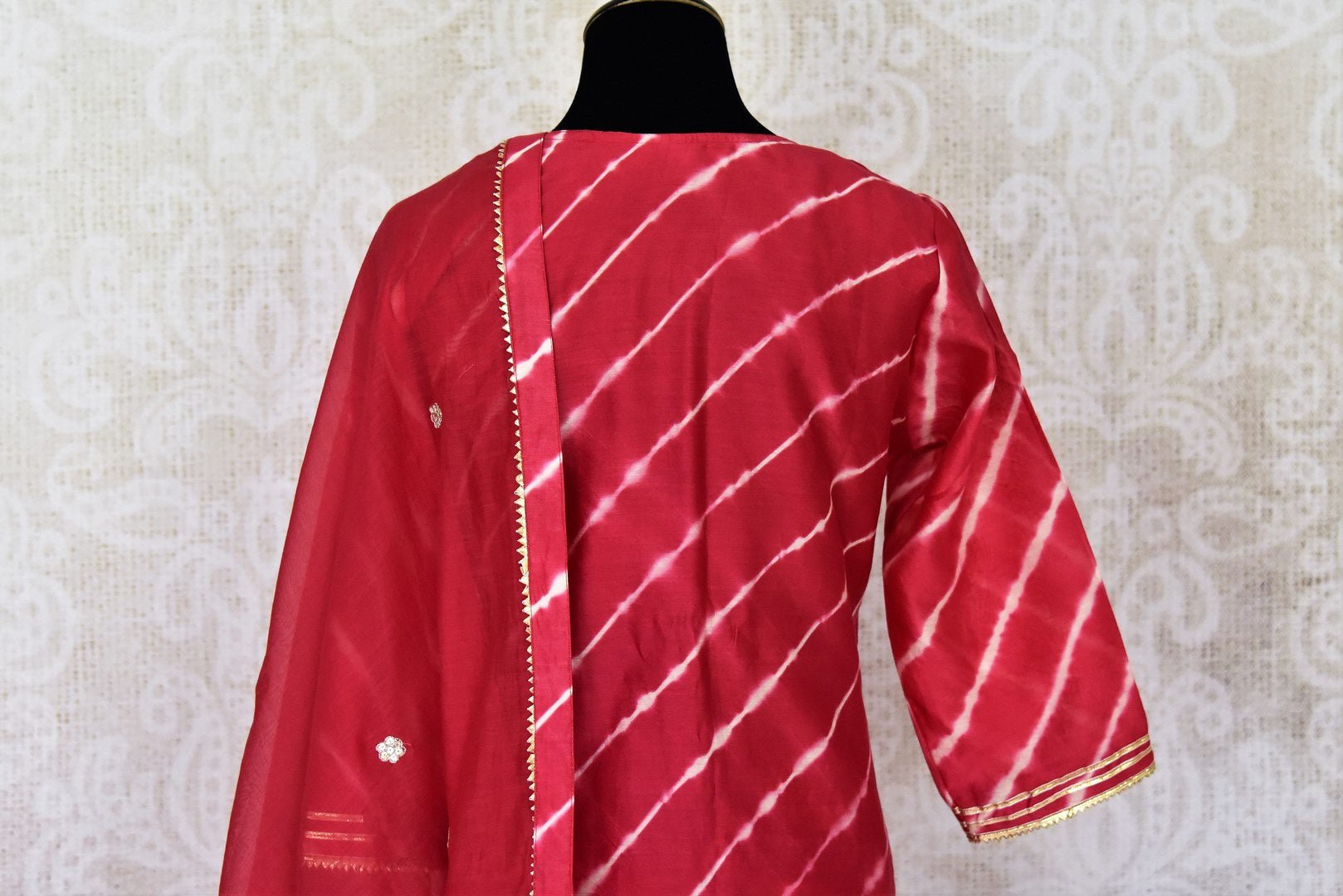 Shop stunning red chanderi silk sharara suit online in USA with dupatta. Get set to dazzle on festive occasions in this exquisite designer suits, Anarkali dress, sharara suits, salwar suits, palazzo suits from Pure Elegance Indian fashion store in USA.-back