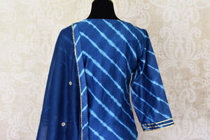 Buy beautiful royal blue chanderi silk sharara suit online in USA with dupatta. Get set to dazzle on festive occasions in this exquisite designer suits, Anarkali dress, sharara suits, salwar suits, palazzo suits from Pure Elegance Indian fashion store in USA.-back