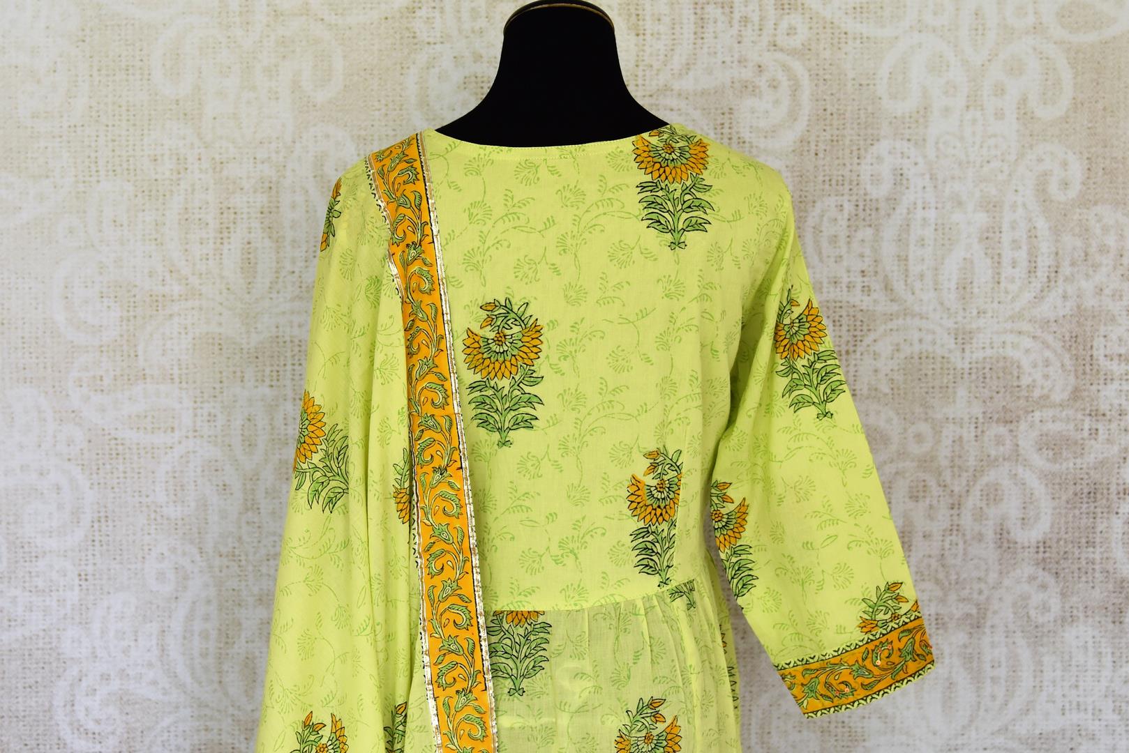 Buy pista green Kalamkari print and gota lace sharara suit online in USA, Be a vision of style and elegance on festive occasions in designer suits, desinger lehenga, sharara suits, Anarkali suit, designer gowns from Pure Elegance Indian fashion store in USA.-back