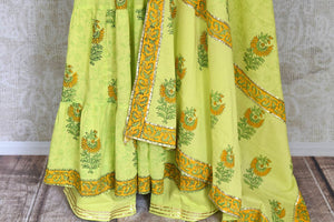 Buy pista green Kalamkari print and gota lace anarkali suit online in USA, Be a vision of style and elegance on festive occasions in designer suits, desinger lehenga, sharara suits, Anarkali suit, designer gowns from Pure Elegance Indian fashion store in USA..-sharara