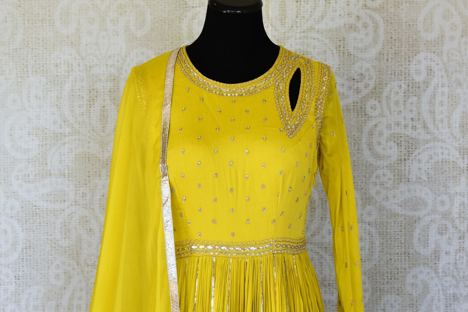 Shop beautiful bright yellow silk Anarkali suit online in USA with gota work. Add an elegant touch to your ethnic style with beautiful designer suits, Anarkali suits, gharara suits, salwar suits, sharara suits from Pure Elegance Indian fashion store in USA.-front