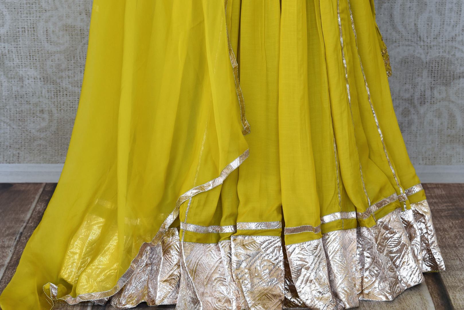 Shop beautiful bright yellow silk Anarkali suit online in USA with gota work. Add an elegant touch to your ethnic style with beautiful designer suits, Anarkali suits, gharara suits, salwar suits, sharara suits from Pure Elegance Indian fashion store in USA.-Anarkali