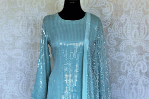 Shop stunning light blue sequin work georgette sharara suit online in USA. Add an elegant touch to your ethnic style with beautiful designer suits, Anarkali suits, gharara suits, salwar suits, sharara suits from Pure Elegance Indian fashion store in USA.-front