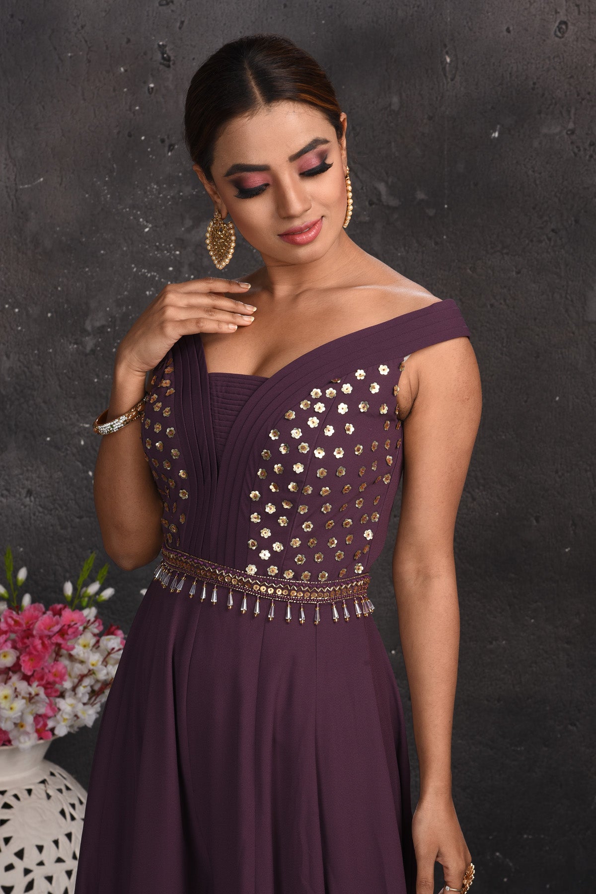 Shop stunning purple off-shoulder embroidered jumpsuit online in USA. Look your best at weddings and special occasions in exclusive designer lehengas, Anarkali suits, sharara suits. designer gowns and Indian dresses from Pure Elegance Indian fashion store in USA.-closeup