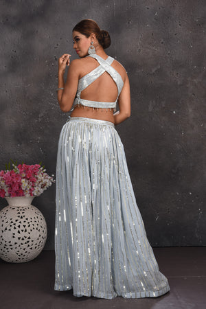 Buy beautiful light grey embellished palazzo crop top online in USA with dupatta. Look your best at weddings and special occasions in exclusive designer lehengas, Anarkali suits, sharara suits. designer gowns and Indian dresses from Pure Elegance Indian fashion store in USA.-back