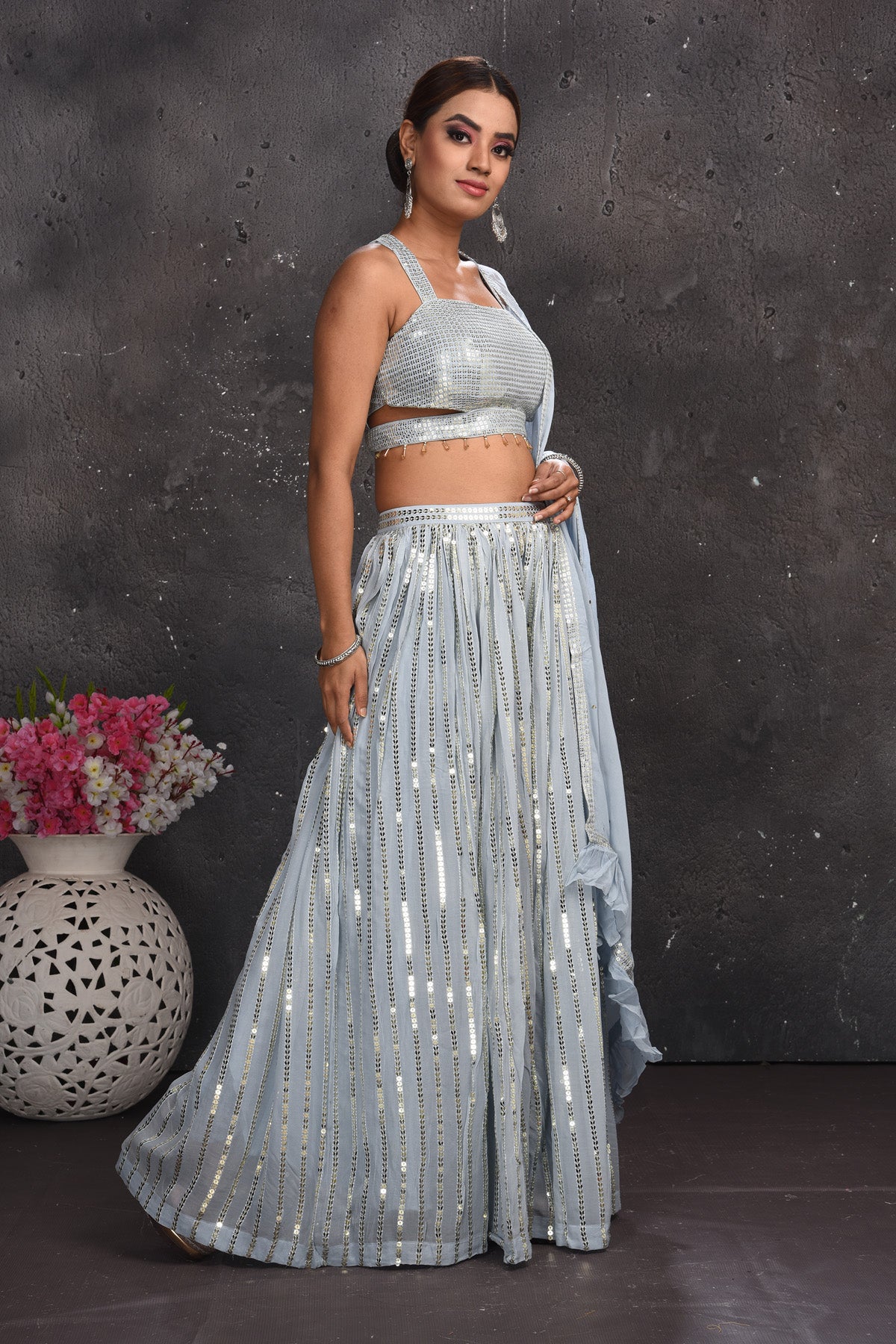 Buy beautiful light grey embellished palazzo crop top online in USA with dupatta. Look your best at weddings and special occasions in exclusive designer lehengas, Anarkali suits, sharara suits. designer gowns and Indian dresses from Pure Elegance Indian fashion store in USA.-right