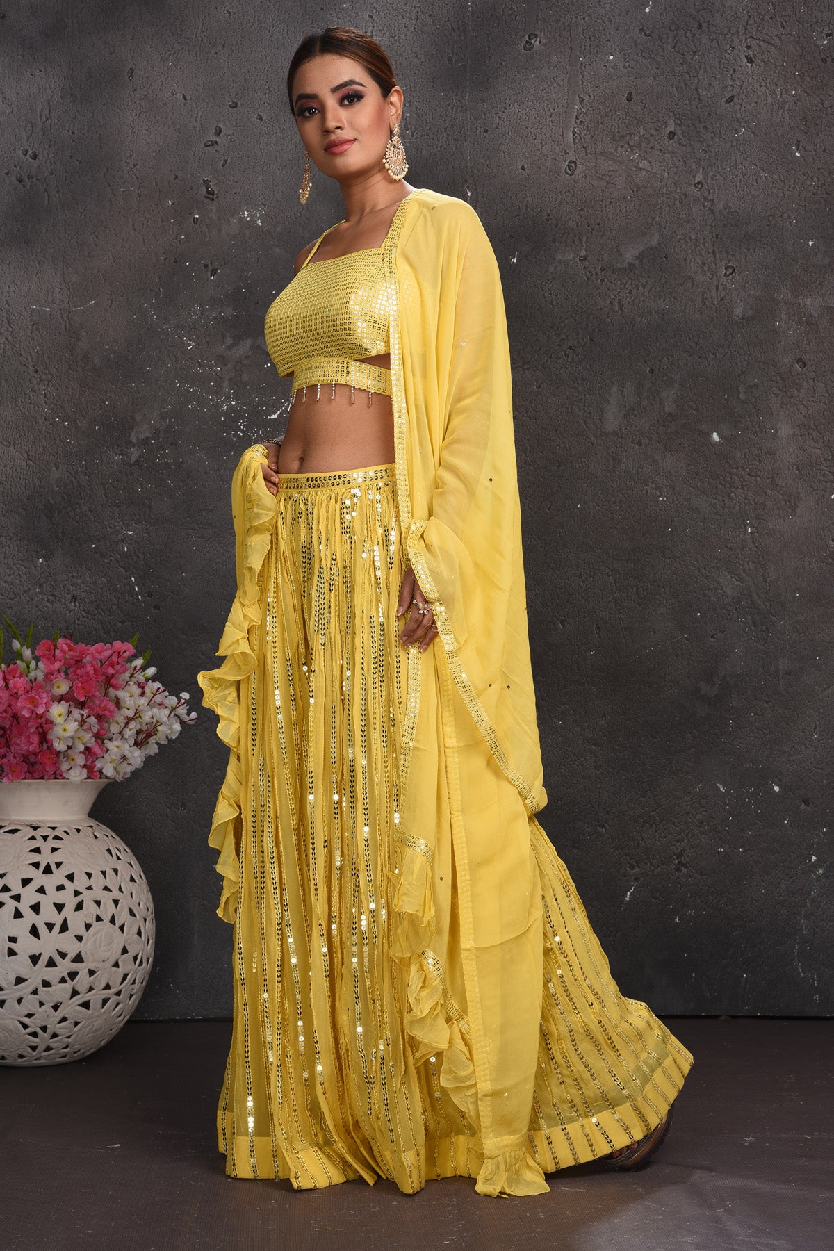Buy stunning light yellow embellished palazzo crop top online in USA with dupatta. Look your best at weddings and special occasions in exclusive designer lehengas, Anarkali suits, sharara suits. designer gowns and Indian dresses from Pure Elegance Indian fashion store in USA.-side
