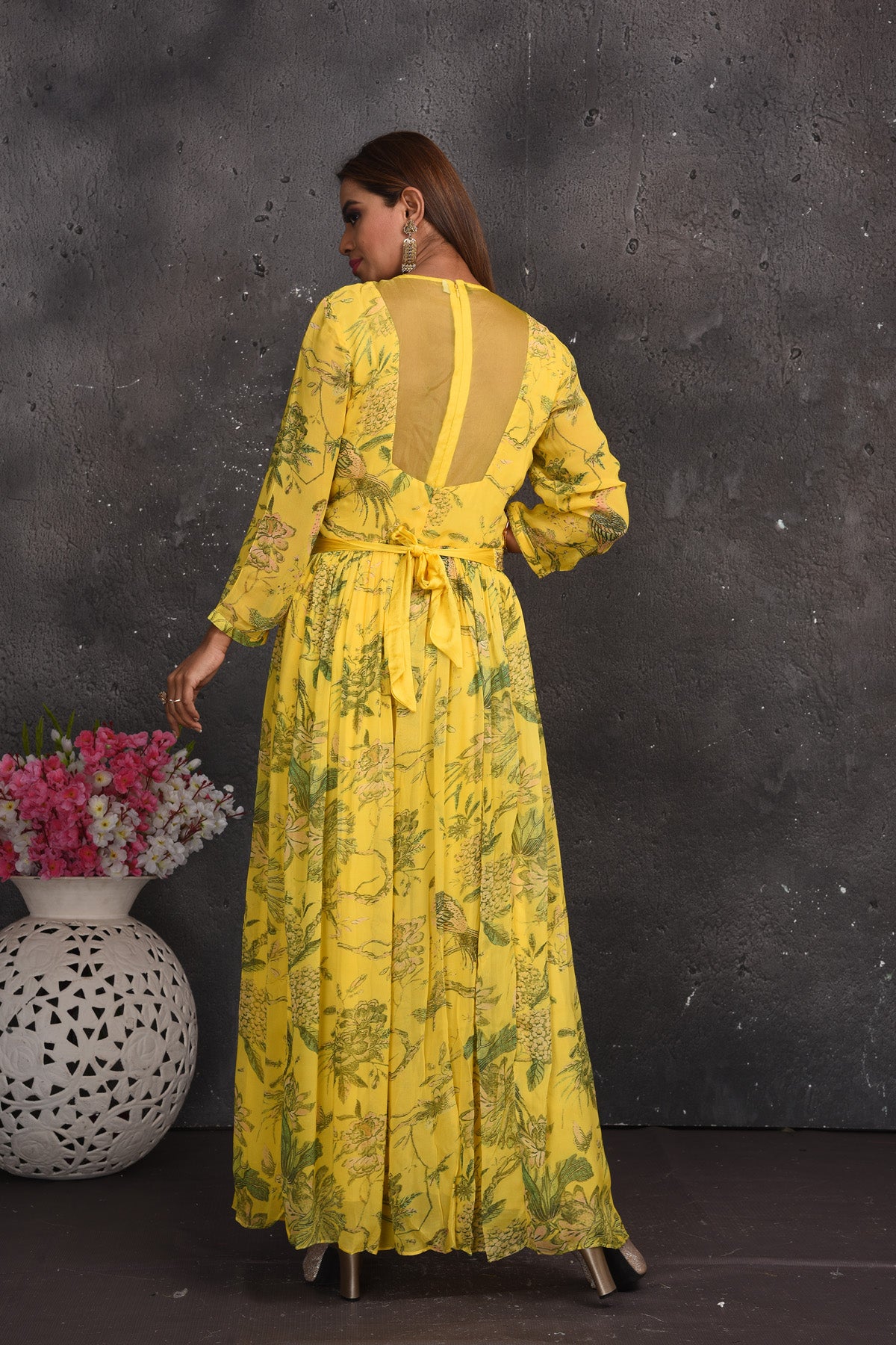 Shop beautiful light yellow floral jumpsuit online in USA with sheer back. Look your best at weddings and special occasions in exclusive designer lehengas, Anarkali suits, sharara suits. designer gowns and Indian dresses from Pure Elegance Indian fashion store in USA.-back