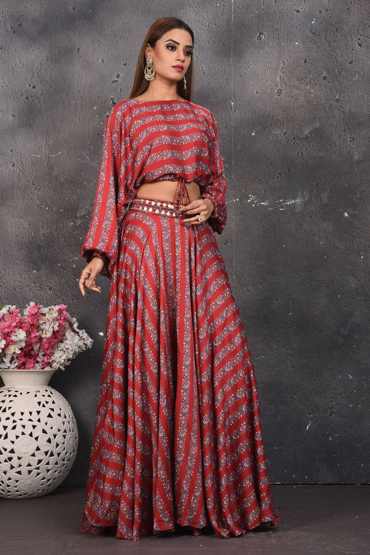 Shop stunning red printed mirror work skirt with crop top online in USA. Look your best at weddings and special occasions in exclusive designer lehengas, Anarkali suits, sharara suits. designer gowns and Indian dresses from Pure Elegance Indian fashion store in USA.-skirt