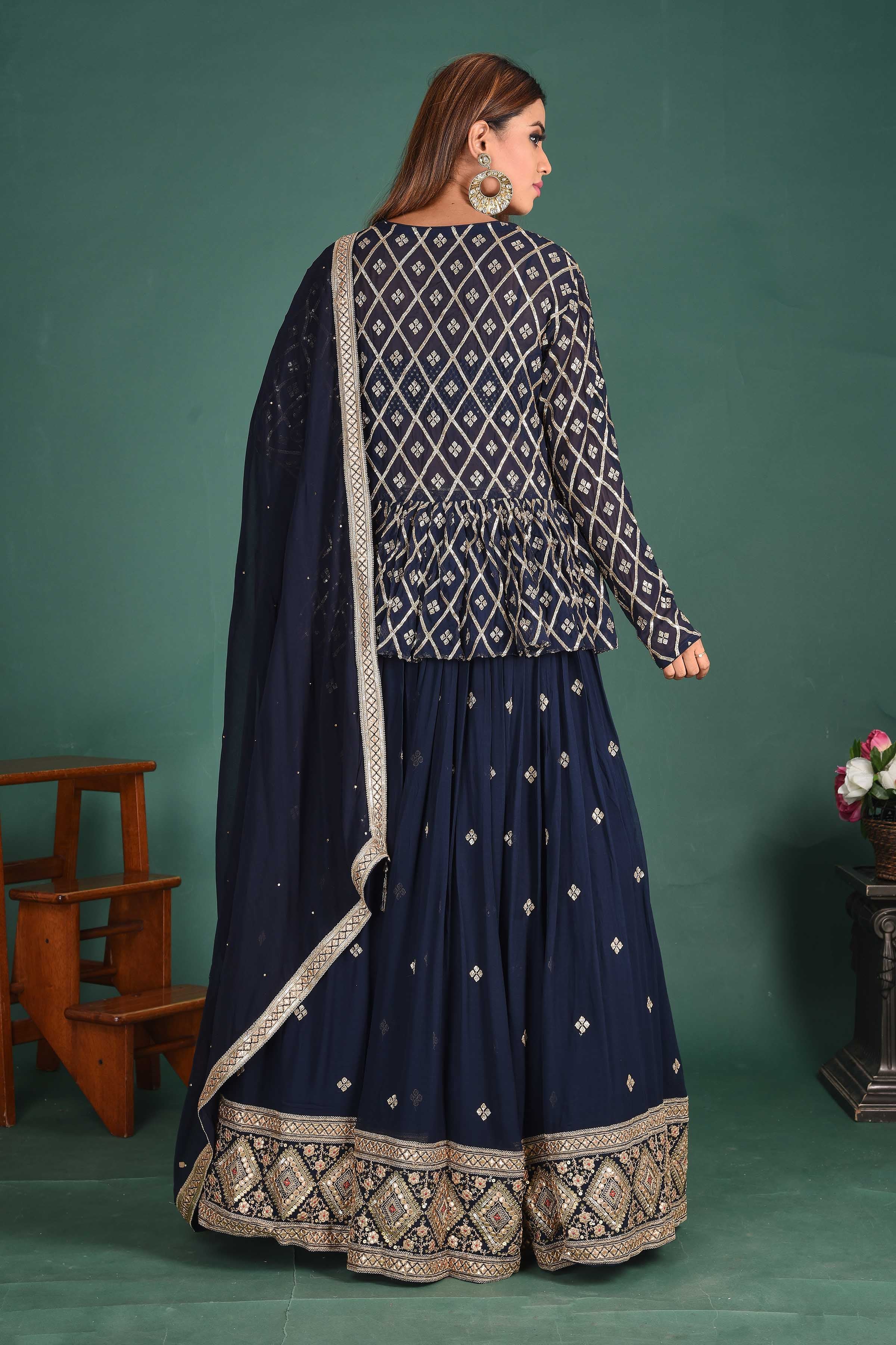 Shop stunning dark blue designer lehenga online in USA with jacket and dupatta. Dazzle on weddings and special occasions with exquisite Indian designer dresses, sharara suits, designer lehengas Anarkali suits, wedding lehengas from Pure Elegance Indian fashion store in USA.-back
