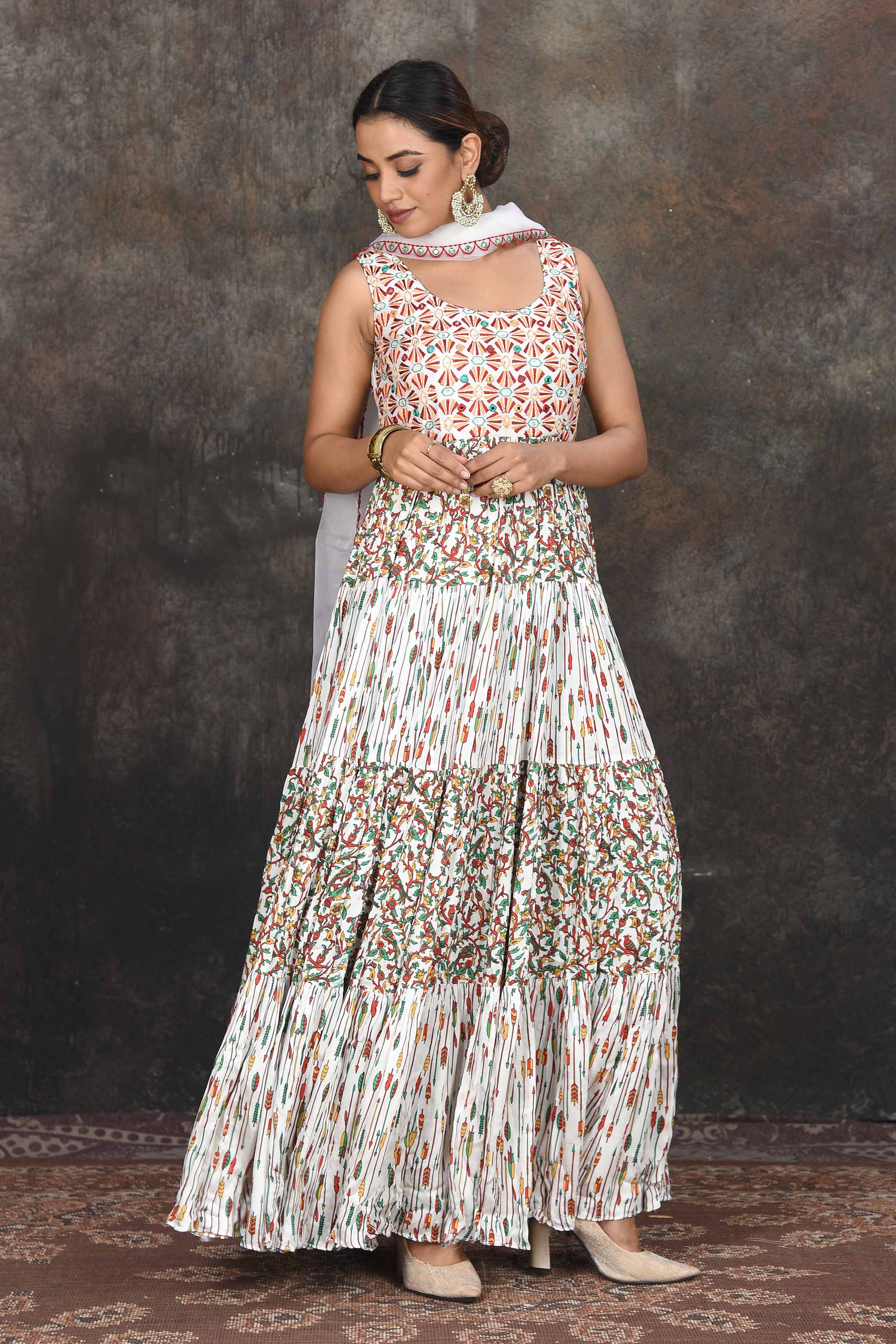 Shop white multicolor print Anarkali dress online in USA with dupatta. Dazzle at sangeet and wedding occasions in this beautiful designer lehengas, Anarkali suits, sharara suit, bridal gowns, bridal lehengas from Pure Elegance Indian fashion store in USA.-front