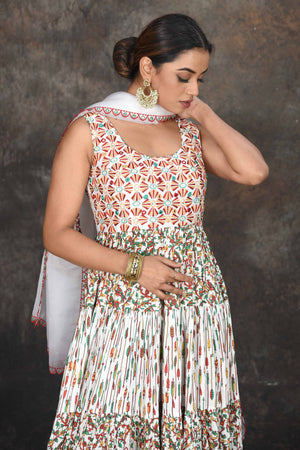 Shop white multicolor print Anarkali dress online in USA with dupatta. Dazzle at sangeet and wedding occasions in this beautiful designer lehengas, Anarkali suits, sharara suit, bridal gowns, bridal lehengas from Pure Elegance Indian fashion store in USA.-closeup