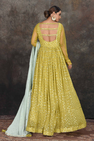Buy beautiful pista green embroidered Anarkali suit online in USA with mint green embroidered dupatta. Dazzle at sangeet and wedding occasions in this beautiful designer lehengas, Anarkali suits, sharara suit, bridal gowns, bridal lehengas from Pure Elegance Indian fashion store in USA.-back