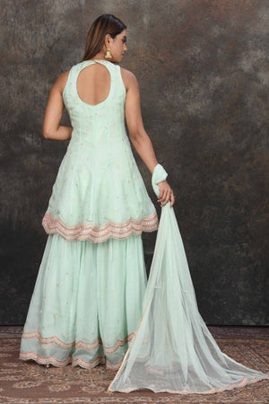 Shop beautiful mint green embroidered sharara suit online in USA with dupatta. Dazzle at sangeet and wedding occasions in this beautiful designer lehengas, Anarkali suits, sharara suit, bridal gowns, bridal lehengas from Pure Elegance Indian fashion store in USA.-back