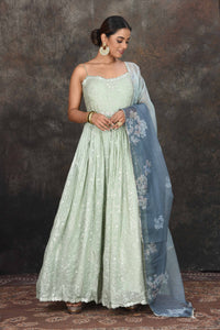 Buy beautiful mint green embroidered Anarkali suit online in USA with floral dupatta. Dazzle at sangeet and wedding occasions in this beautiful designer lehengas, Anarkali suits, sharara suit, bridal gowns, bridal lehengas from Pure Elegance Indian fashion store in USA.-full view