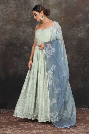 Buy beautiful mint green embroidered Anarkali suit online in USA with floral dupatta. Dazzle at sangeet and wedding occasions in this beautiful designer lehengas, Anarkali suits, sharara suit, bridal gowns, bridal lehengas from Pure Elegance Indian fashion store in USA.-front