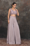 Shop stunning grey applique work crop top online in USA with palazzo. Dazzle at sangeet and wedding occasions in this beautiful designer lehengas, Anarkali suits, sharara suit, bridal gowns, bridal lehengas from Pure Elegance Indian fashion store in USA.-full view