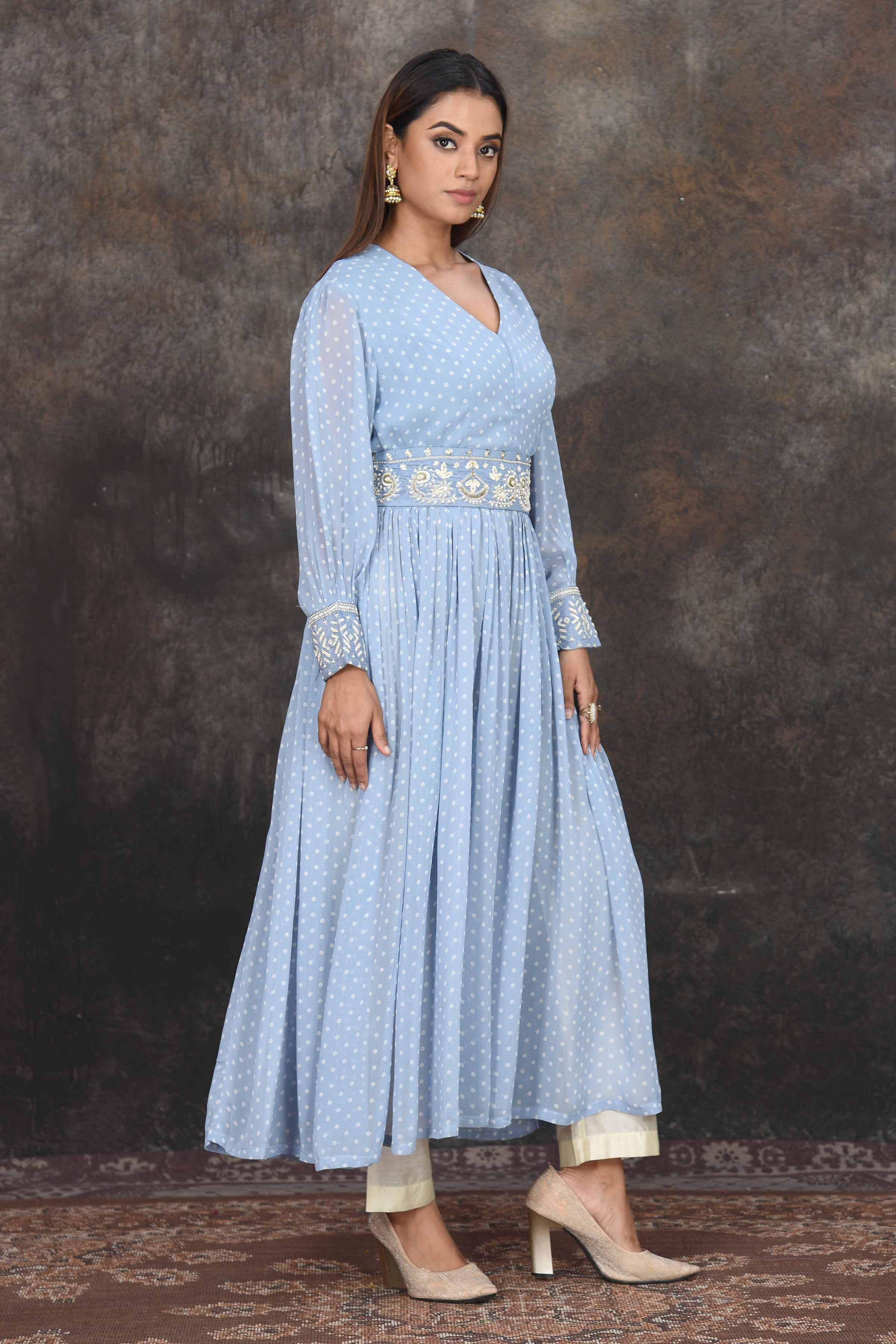Shop light blue bandhej Anarkali online in USA with cream pants. Dazzle at sangeet and wedding occasions in this beautiful designer lehengas, Anarkali suits, sharara suit, bridal gowns, bridal lehengas from Pure Elegance Indian fashion store in USA.-side