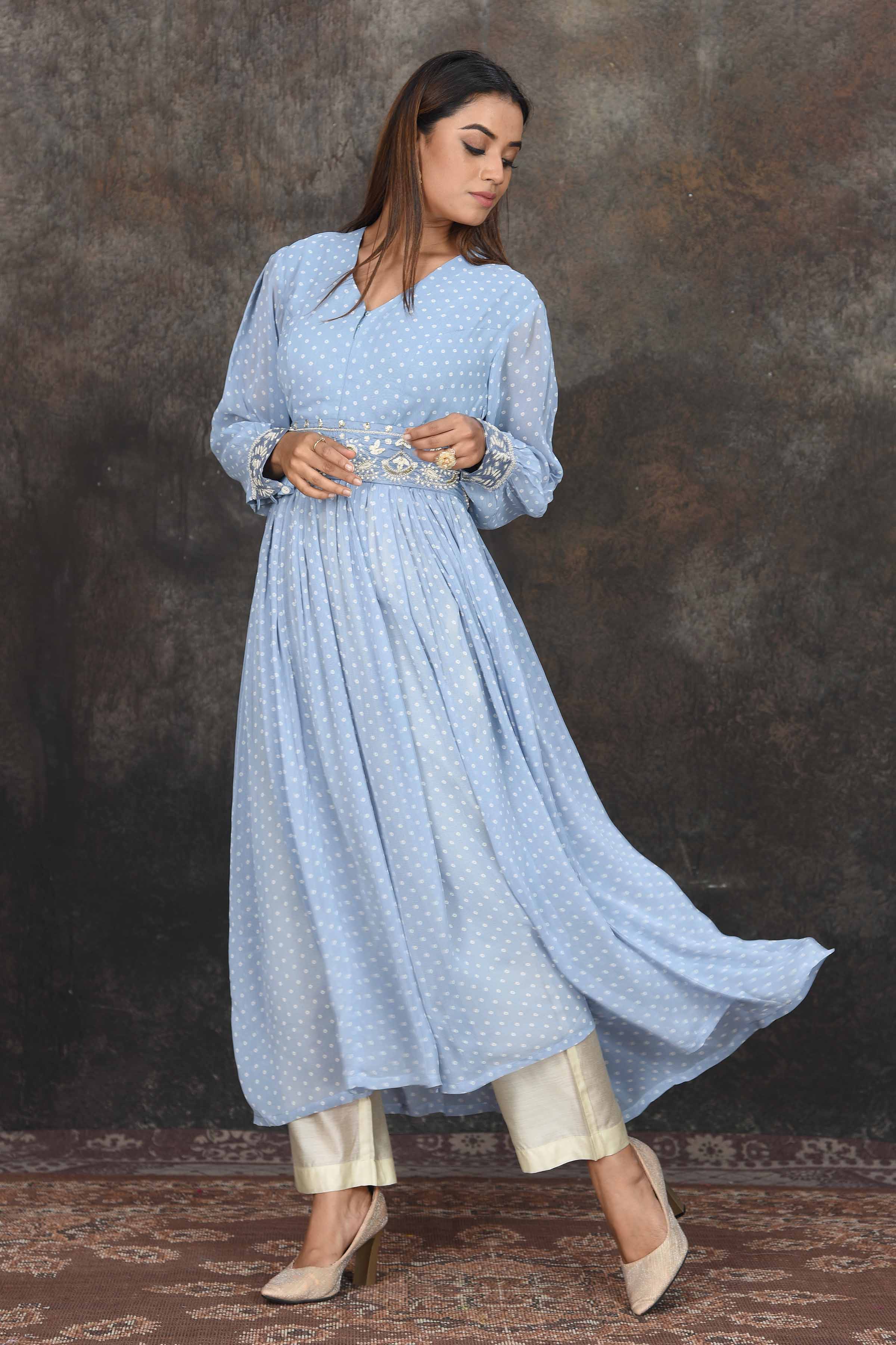 Shop light blue bandhej Anarkali online in USA with cream pants. Dazzle at sangeet and wedding occasions in this beautiful designer lehengas, Anarkali suits, sharara suit, bridal gowns, bridal lehengas from Pure Elegance Indian fashion store in USA.-front
