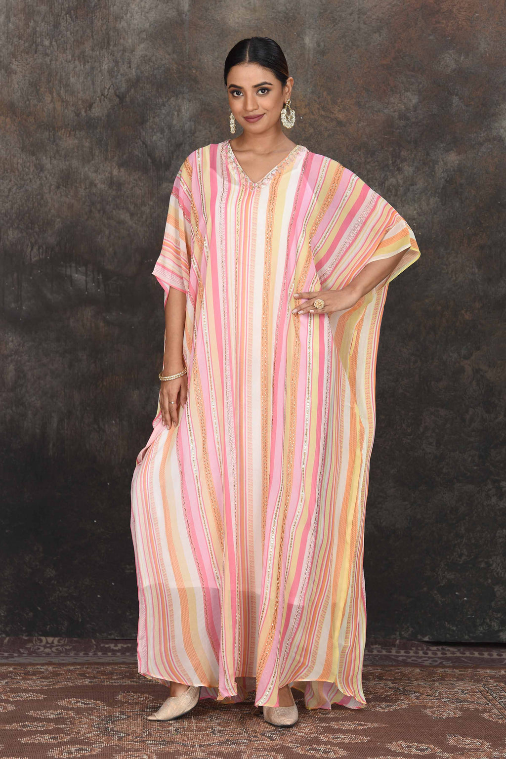 Shop stunning cream and pink stripes embroidered kaftaan online in USA. Dazzle at sangeet and wedding occasions in this beautiful designer lehengas, Anarkali suits, sharara suit, bridal gowns, bridal lehengas from Pure Elegance Indian fashion store in USA.-full view