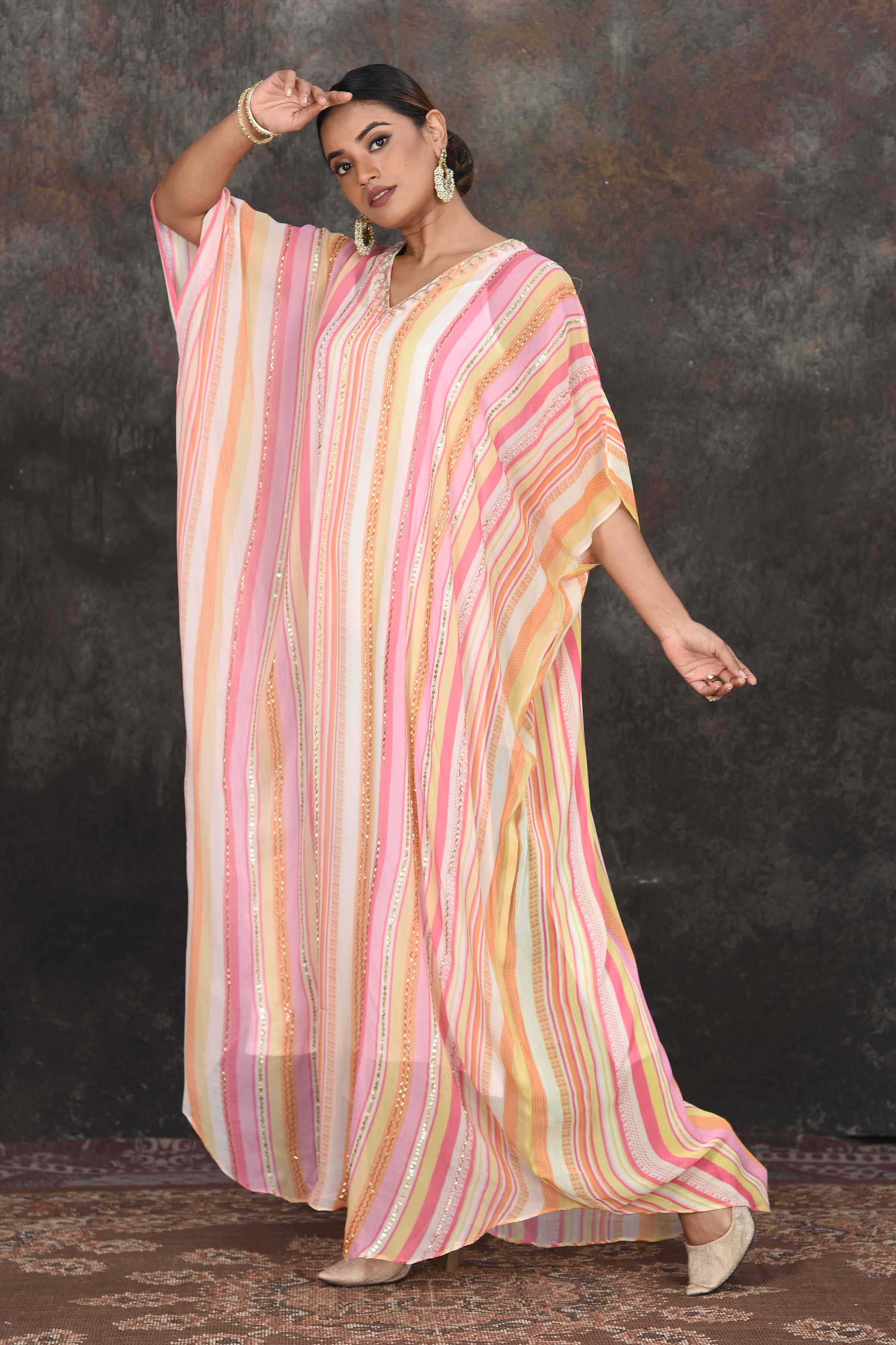 Shop stunning cream and pink stripes embroidered kaftaan online in USA. Dazzle at sangeet and wedding occasions in this beautiful designer lehengas, Anarkali suits, sharara suit, bridal gowns, bridal lehengas from Pure Elegance Indian fashion store in USA.-side