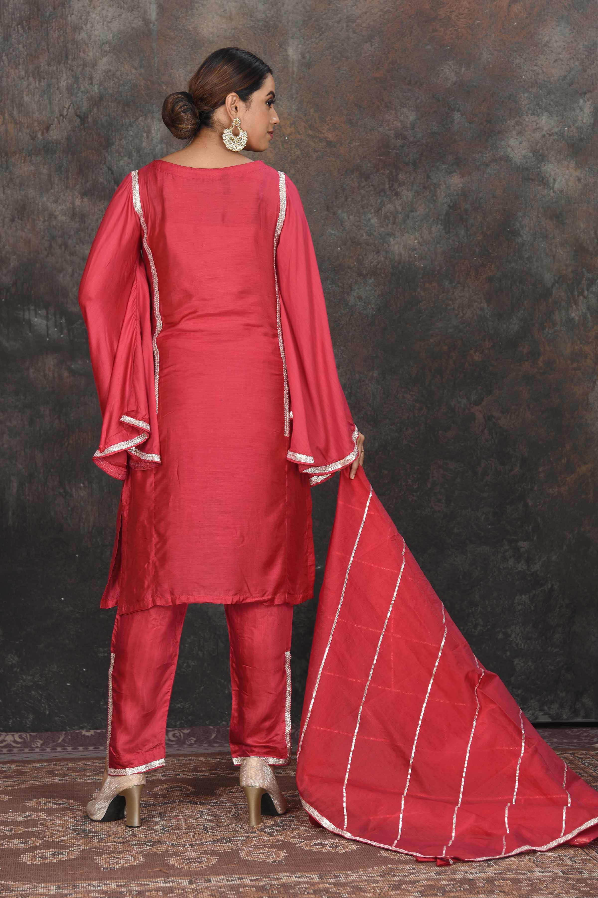Buy elegant red embroidered sharara suit online in USA with dupatta. Dazzle at sangeet and wedding occasions in this beautiful designer lehengas, Anarkali suits, sharara suit, bridal gowns, bridal lehengas from Pure Elegance Indian fashion store in USA.-back