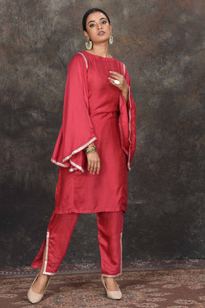 Buy elegant red embroidered sharara suit online in USA with dupatta. Dazzle at sangeet and wedding occasions in this beautiful designer lehengas, Anarkali suits, sharara suit, bridal gowns, bridal lehengas from Pure Elegance Indian fashion store in USA.-side