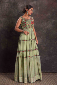Shop beautiful pista green embroidered sleeveless party gown online in USA. Look your ethnic best on festive occasions with latest designer sarees, pure silk sarees, Kanchipuram silk sarees, designer dresses, Anarkali suits, gown, embroidered sarees from Pure Elegance Indian fashion store in USA.-full view