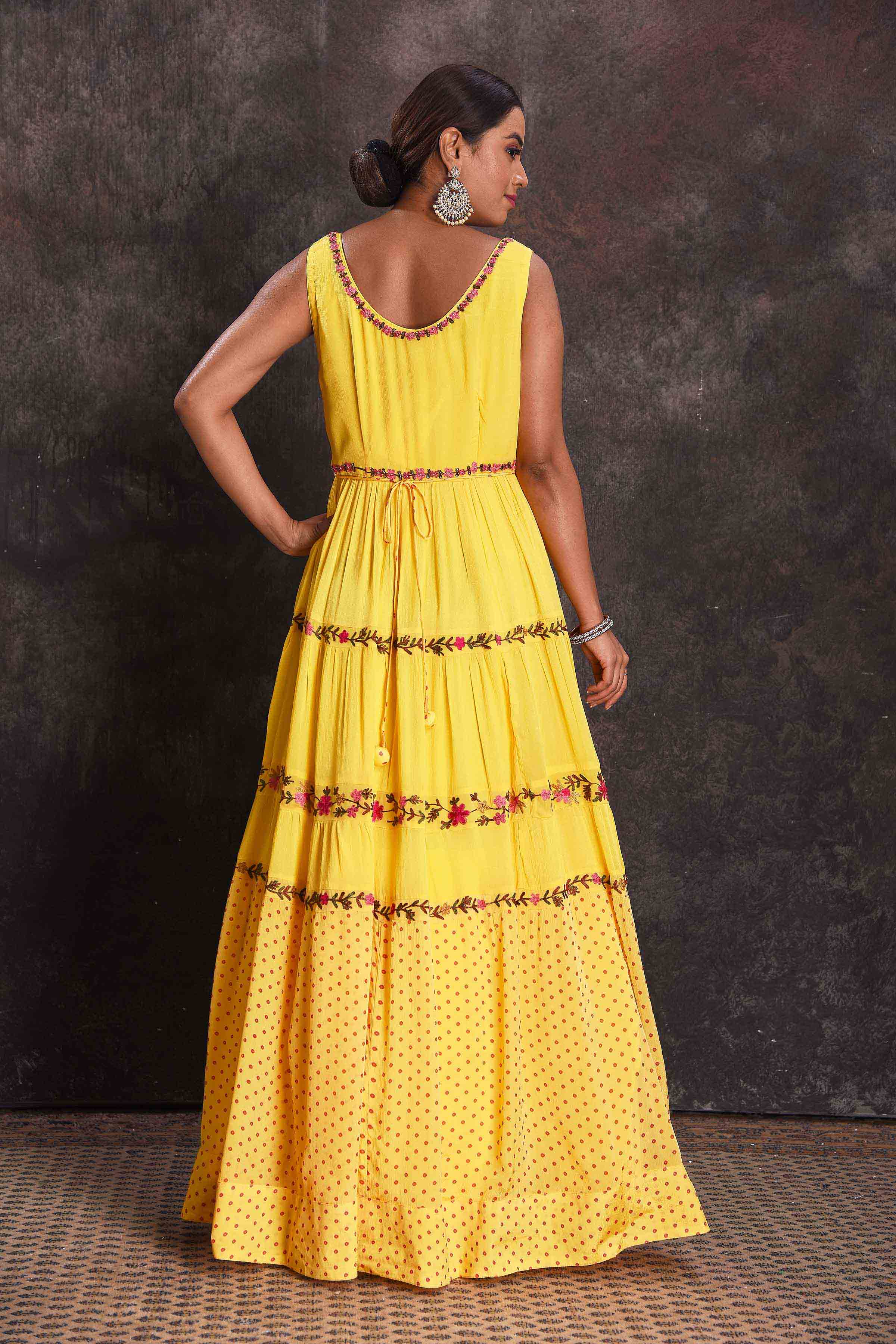 Buy beautiful yellow embroidered sleeveless party gown online in USA. Look your ethnic best on festive occasions with latest designer sarees, pure silk sarees, Kanchipuram silk sarees, designer dresses, Anarkali suits, gown, embroidered sarees from Pure Elegance Indian fashion store in USA.-back