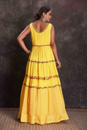 Buy beautiful yellow embroidered sleeveless party gown online in USA. Look your ethnic best on festive occasions with latest designer sarees, pure silk sarees, Kanchipuram silk sarees, designer dresses, Anarkali suits, gown, embroidered sarees from Pure Elegance Indian fashion store in USA.-back