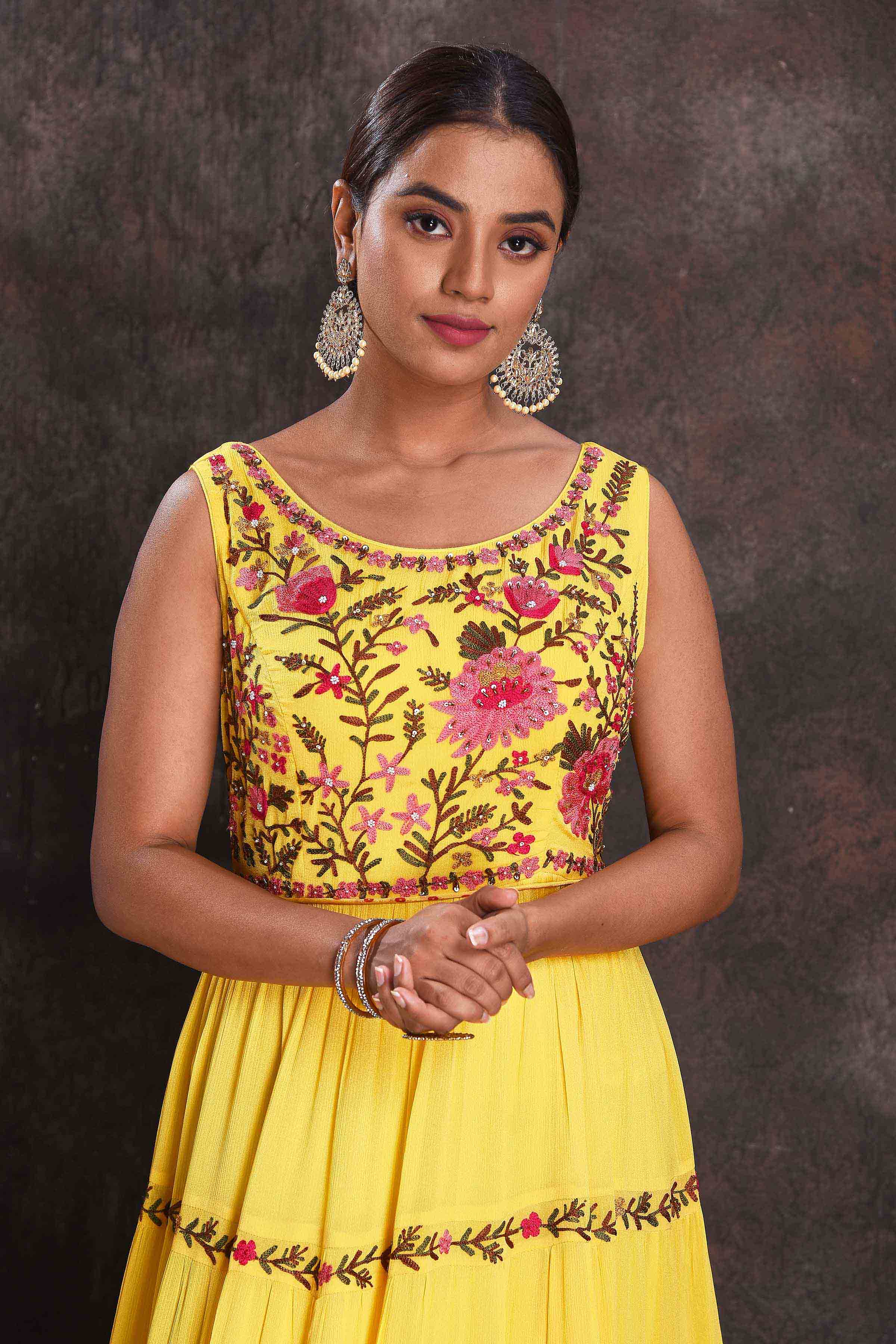 Buy beautiful yellow embroidered sleeveless party gown online in USA. Look your ethnic best on festive occasions with latest designer sarees, pure silk sarees, Kanchipuram silk sarees, designer dresses, Anarkali suits, gown, embroidered sarees from Pure Elegance Indian fashion store in USA.-closeup