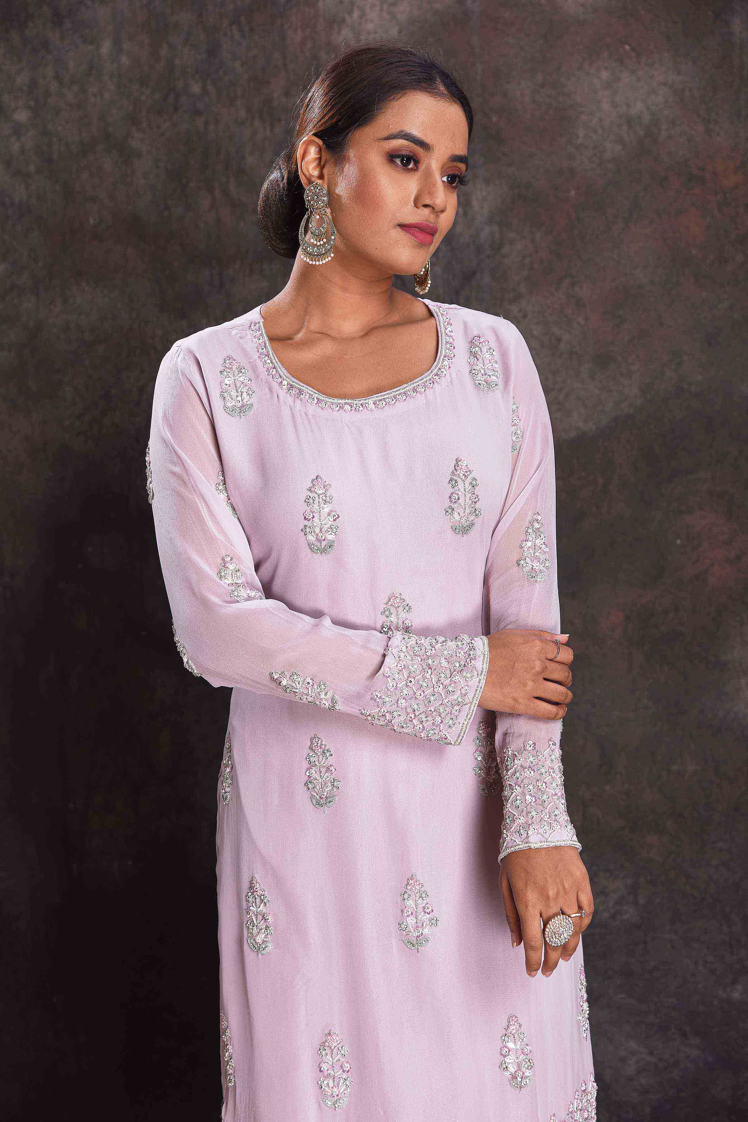 Shop stunning lilac embroidered sharara suit online in USA with dupatta. Look your ethnic best on festive occasions with latest designer sarees, pure silk sarees, Kanchipuram silk sarees, designer dresses, Anarkali suits, gown, embroidered sarees from Pure Elegance Indian fashion store in USA.-closeup