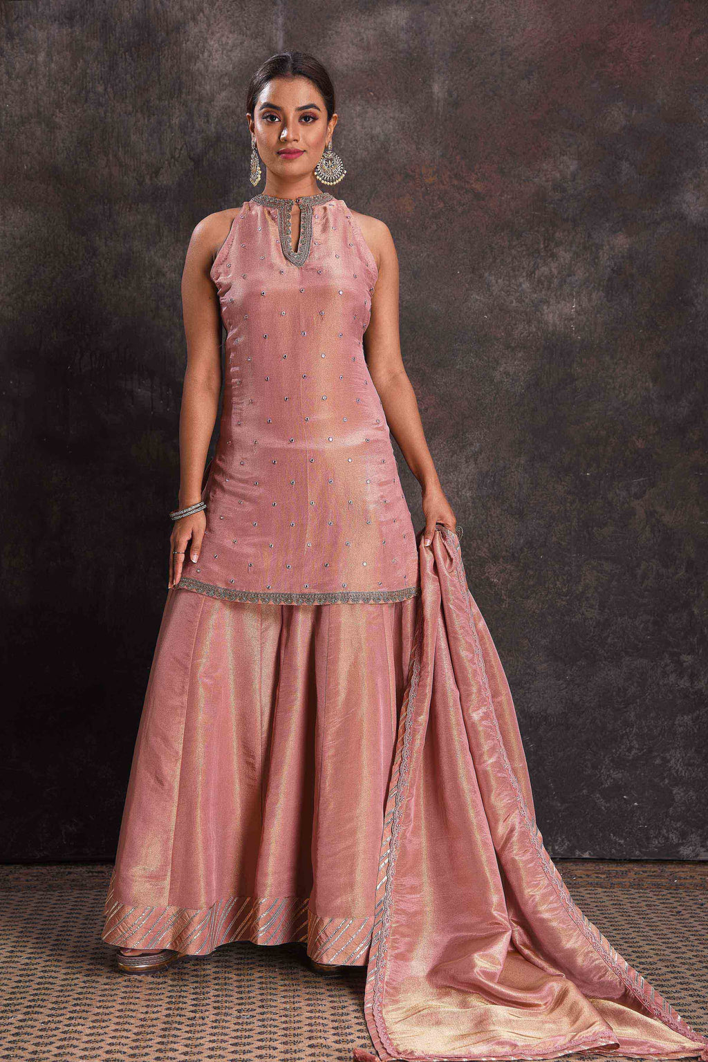 Buy stunning golden pink mirror work sharara suit online in USA with dupatta. Look your ethnic best on festive occasions with latest designer sarees, pure silk sarees, Kanchipuram silk sarees, designer dresses, Anarkali suits, gown, embroidered sarees from Pure Elegance Indian fashion store in USA.-full view