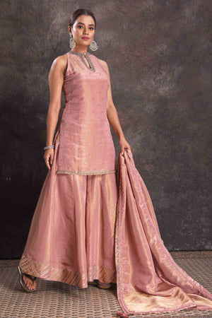 Buy stunning golden pink mirror work sharara suit online in USA with dupatta. Look your ethnic best on festive occasions with latest designer sarees, pure silk sarees, Kanchipuram silk sarees, designer dresses, Anarkali suits, gown, embroidered sarees from Pure Elegance Indian fashion store in USA.-right