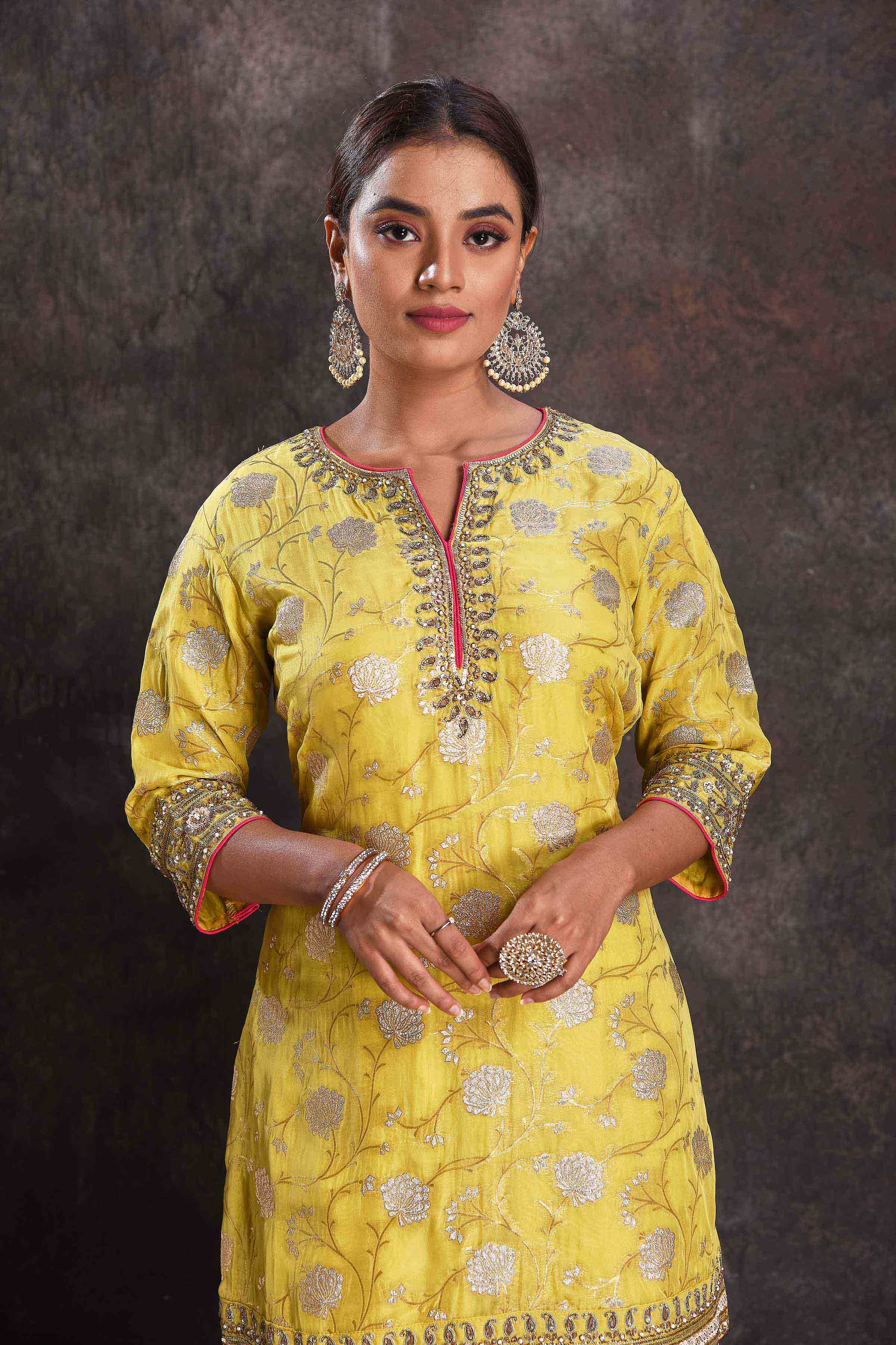 Buy beautiful bright yellow designer embroidered gharara suit online in USA with dupatta. Look your ethnic best on festive occasions with latest designer sarees, pure silk sarees, Kanchipuram silk sarees, designer dresses, Anarkali suits, gown, embroidered sarees from Pure Elegance Indian fashion store in USA.-closeup